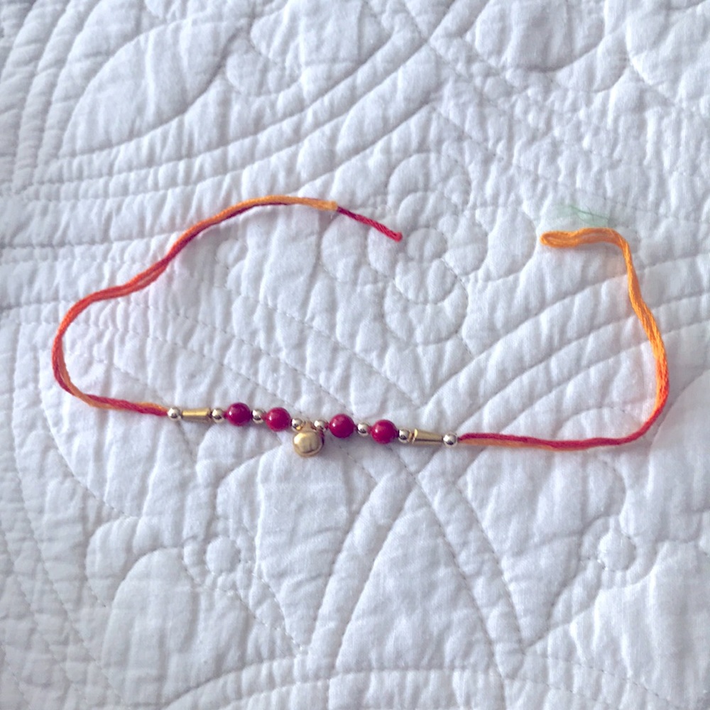 Indian style gold and red bracelet